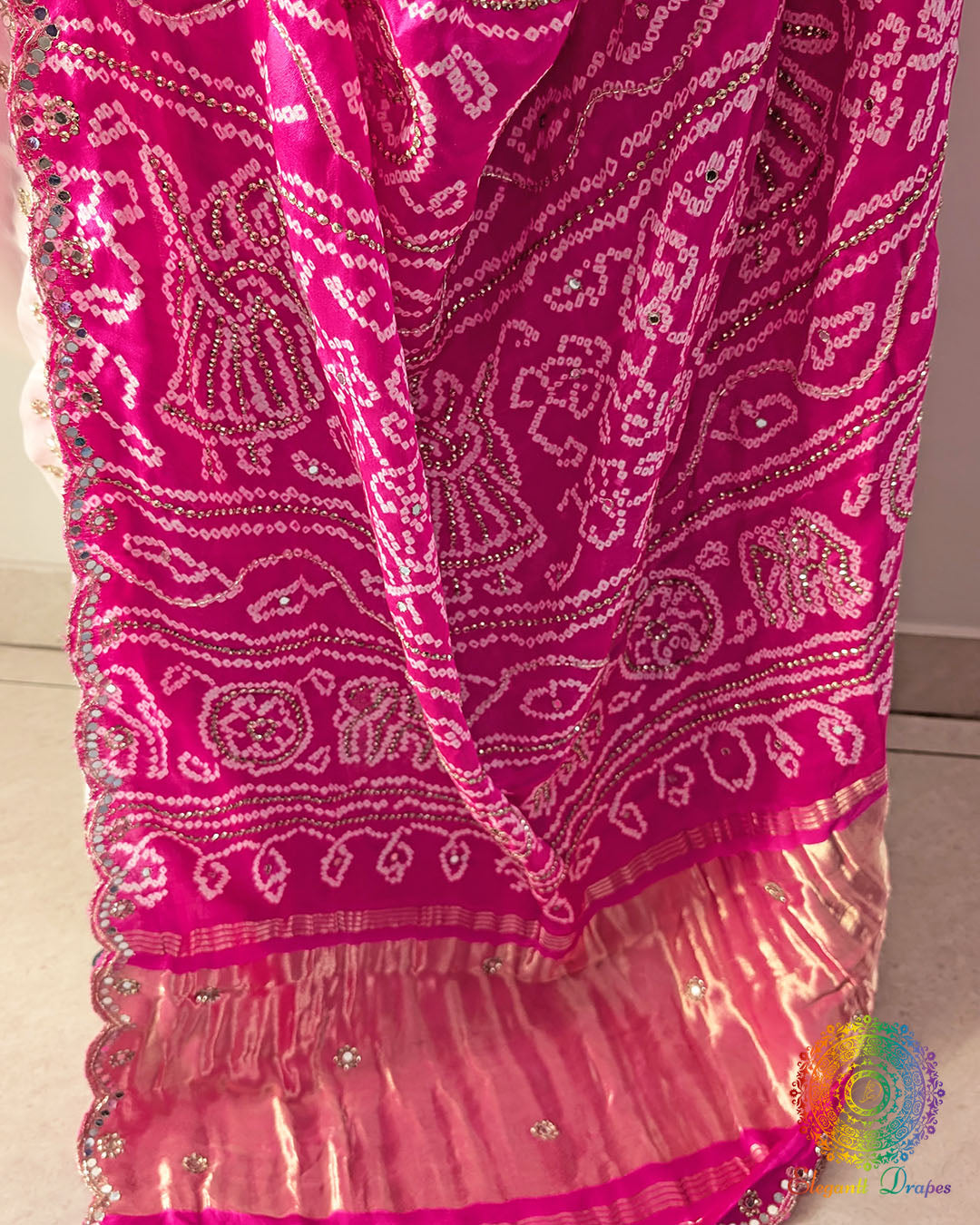 Detailed view of Rasmandal design and gota patti embellishments on saree palla