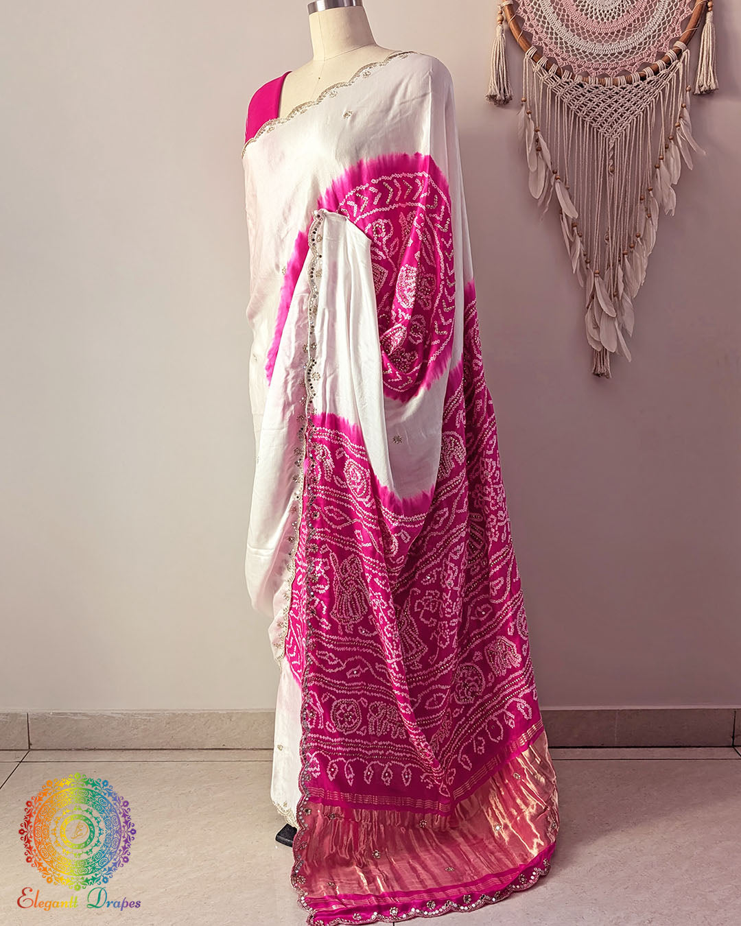 Side angle view of white pink Rasmandal saree showcasing elegant silk drape