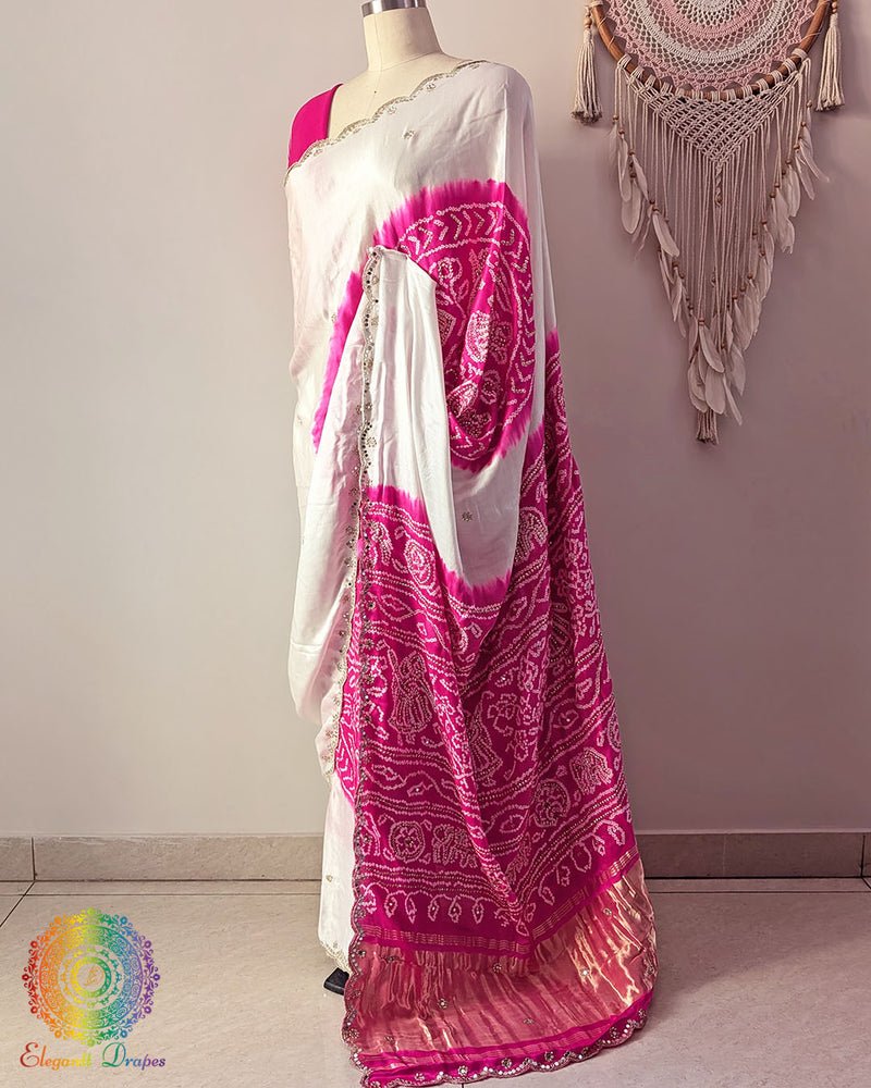 Side angle view of white pink Rasmandal saree showcasing elegant silk drape