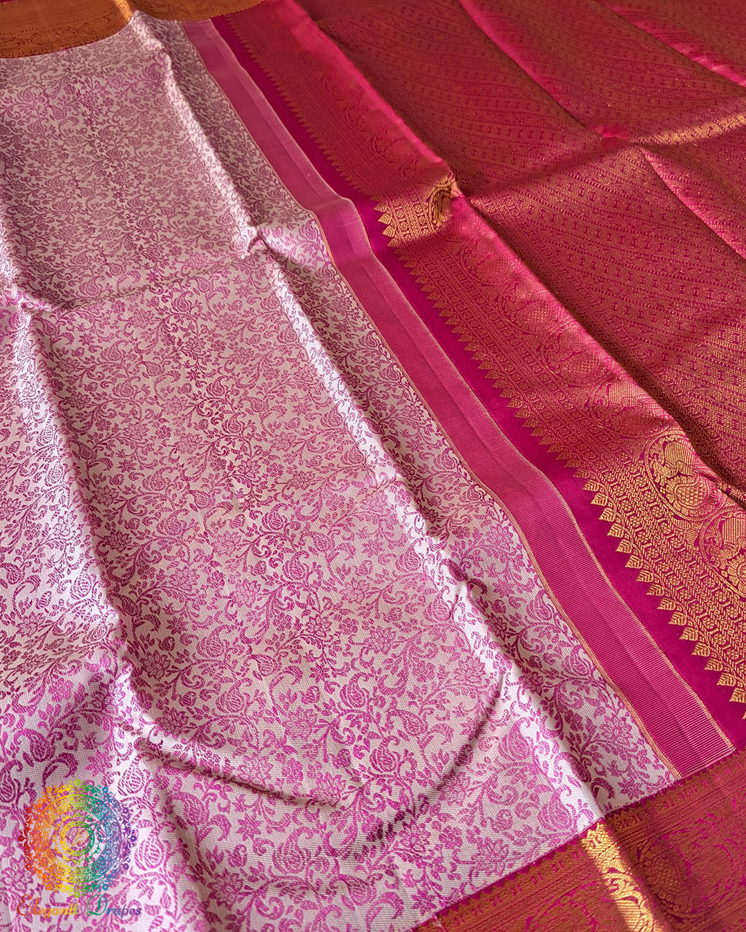 White Kanjivaram saree body close up highlighting pink thread weaving