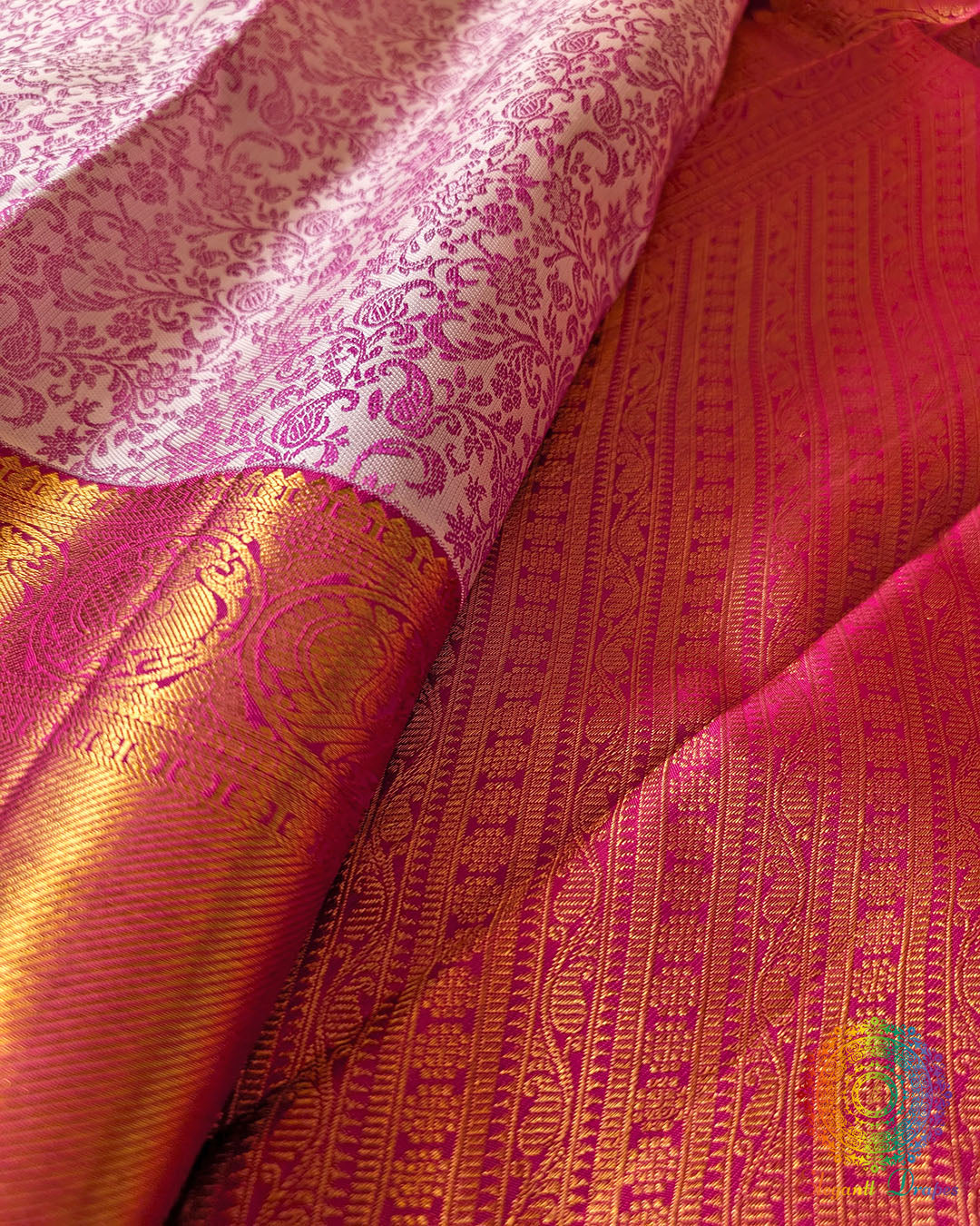 Detailed view of pink border and 2 gram zari weaving on Kanjivaram saree