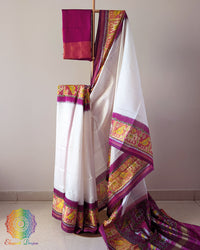 White Pink Handwoven Mulberry Silk Rajkot Patola Saree – Full Drape View showcasing the elegant white and pink colour combination, traditional Rajkot Patola motifs and the rich texture of handwoven mulberry silk in a graceful drape.