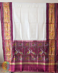 White Pink Handwoven Mulberry Silk Rajkot Patola Saree – Full Saree View displaying the complete saree with its intricate traditional patterns, contrasting pink details and white silk base, highlighting the artistry of Gujarati Patola weaving.