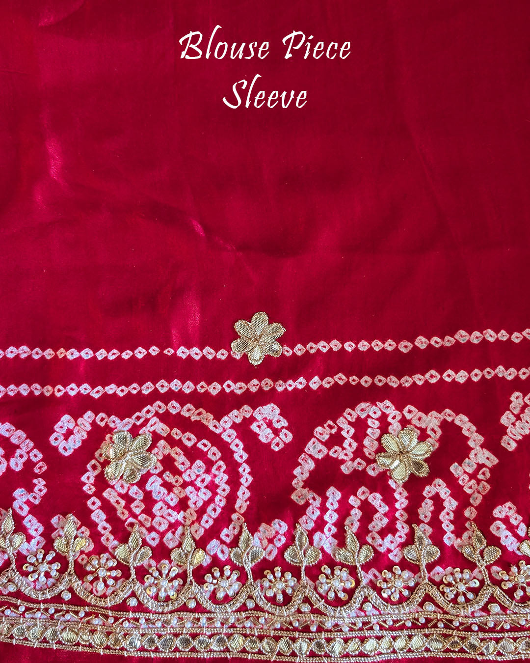Matching blouse sleeve showcasing coordinated gota patti work and fabric detailing