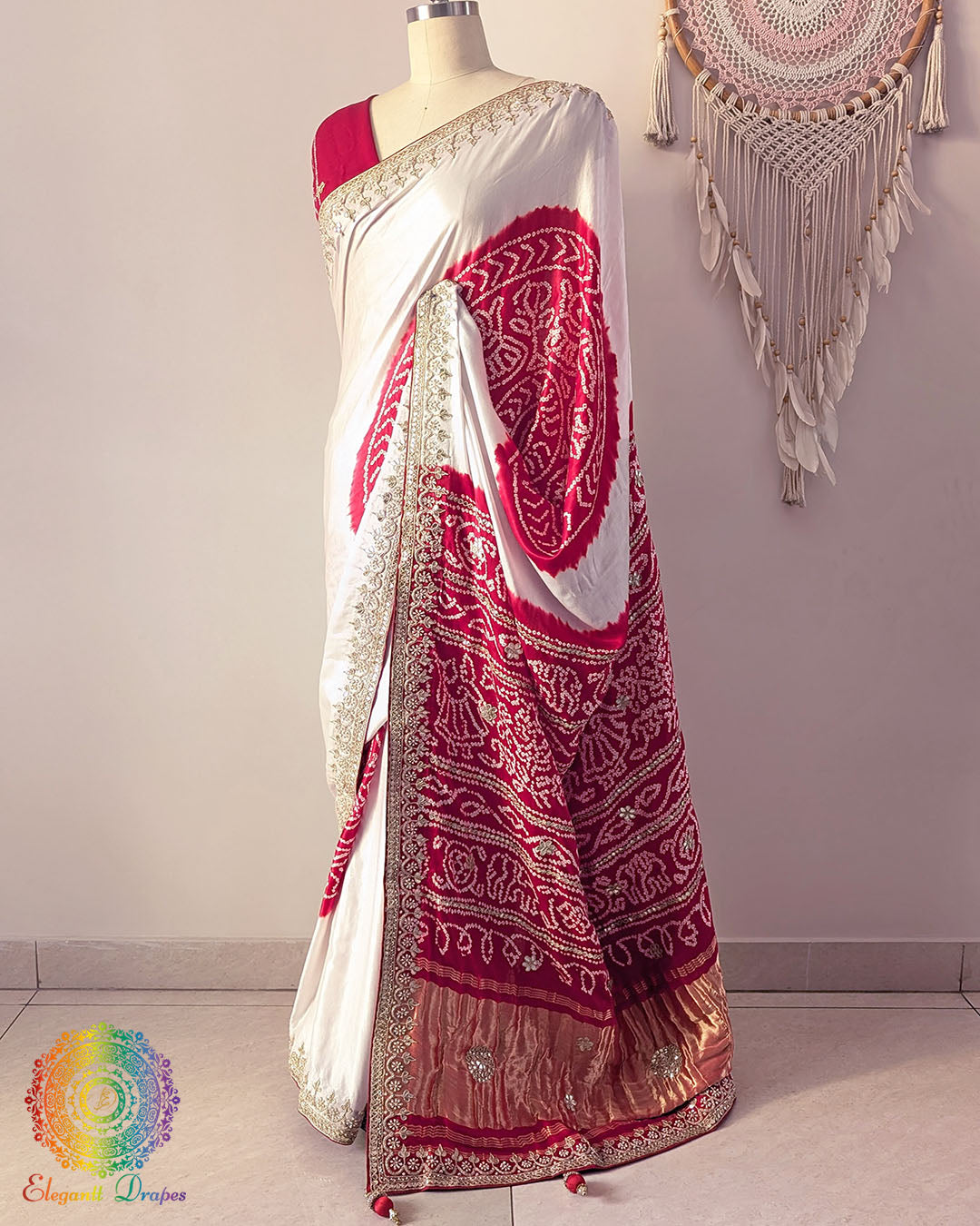 Side angle view of white and red gaji silk Rasmandal saree showcasing elegant silk drape