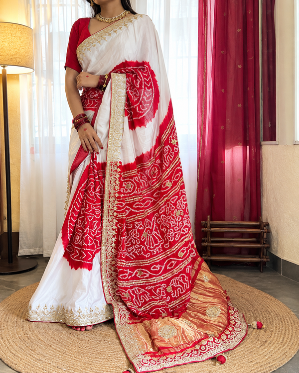 Full drapes of Model wearing our white and red gaji silk Rasmandal saree with gota patti handwork
