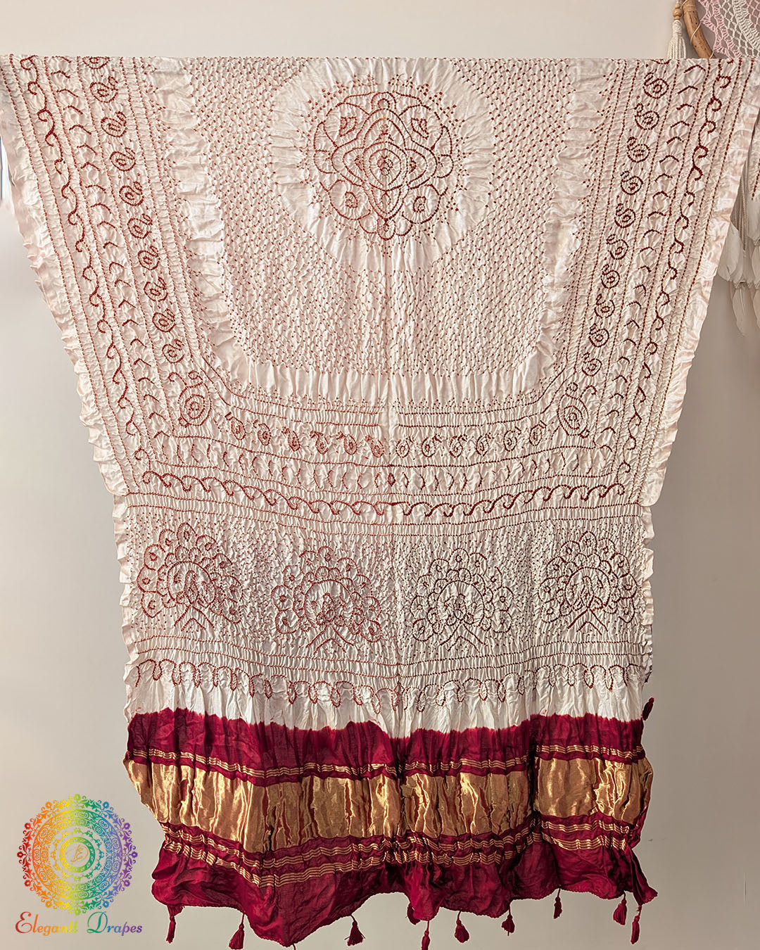 Close up of white bandhani gaji silk dupatta showing tie dye detail
