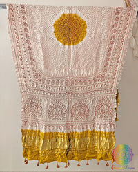 Close up of white bandhani gaji silk dupatta showing tie dye detail