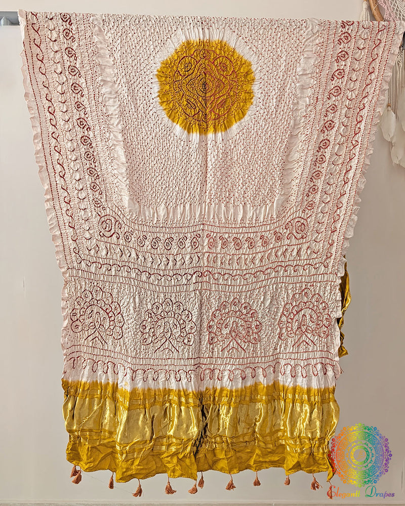 Close up of white bandhani gaji silk dupatta showing tie dye detail