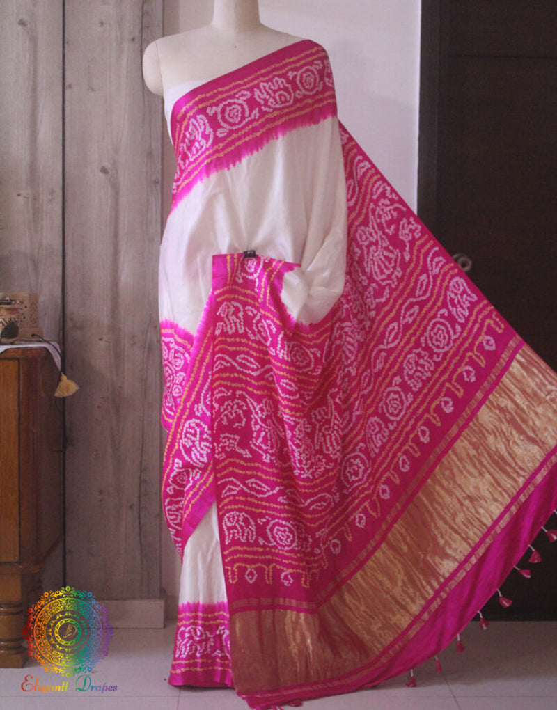 Close up of Bandhani work on White Pink Gajji silk saree