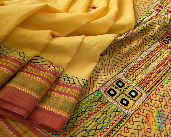 Close up of yellow Ilkal cotton saree with Lambani embroidery