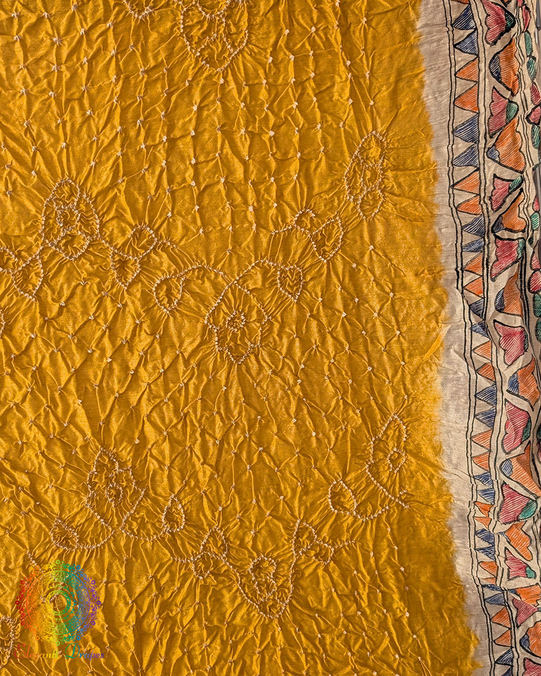 Close-up of the hand-painted Madhubani artwork on the Yellow Muga Silk Dupatta
