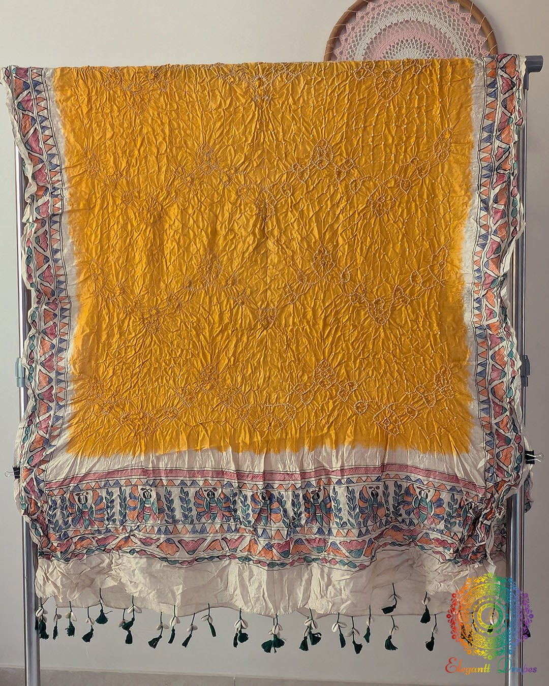 Yellow Muga Silk Dupatta with Bandhani body and hand-painted Madhubani artwork border