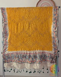 Yellow Muga Silk Dupatta with Bandhani body and hand-painted Madhubani artwork border