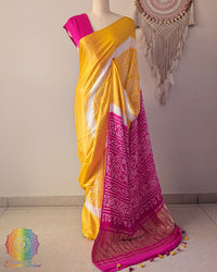 Yellow pure Gaji silk Bandhani saree drape view