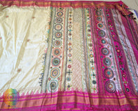 Full pale yellow Ilkal silk saree laid flat showing pink palla and border