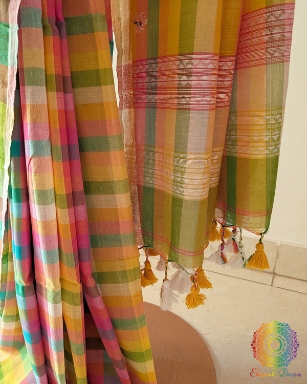 Close up of yellow and pink Madras checks on Bengal cotton saree