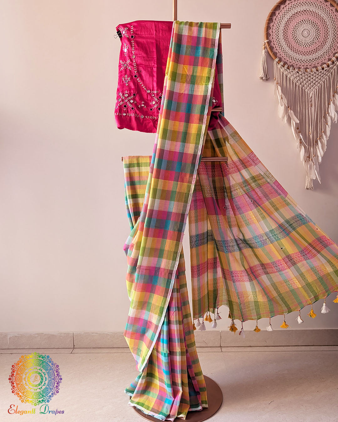 Intricately woven Jamdani palla on yellow and pink Madras checks Bengal cotton saree