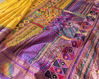 Yellow Lambani embroidered Ilkal silk saree full layout view with purple accents