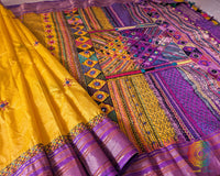 Detailed view of handcrafted embroidery on purple palla of Ilkal silk saree