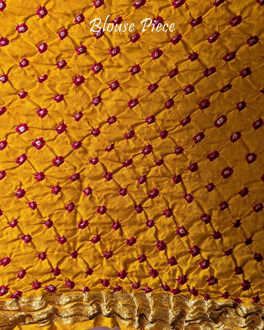 Matching blouse piece with coordinated Bandhani design and Nakshi border detailing