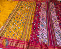 Detailed view of handcrafted embroidery on red palla of Ilkal silk saree